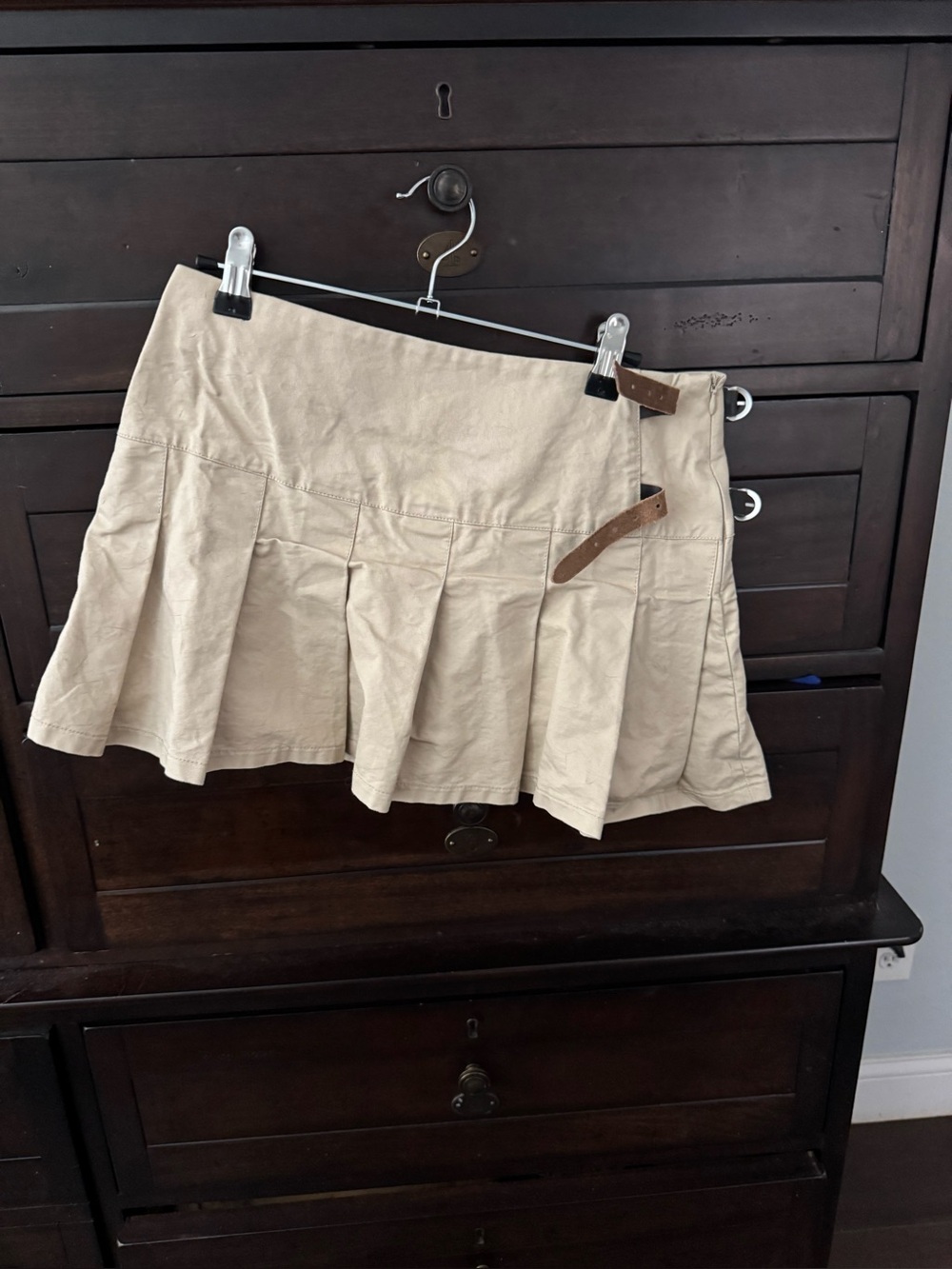 Beige Pleated Mini Skirt with Buckle Detail